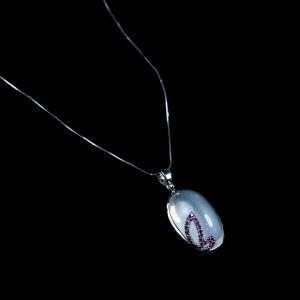 Moonstone with Ruby White Gold